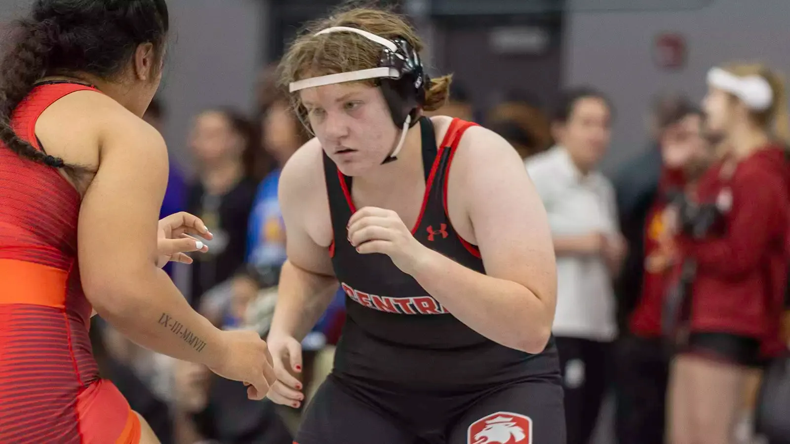 Laura Totty wrestles in her first collegiate tournament