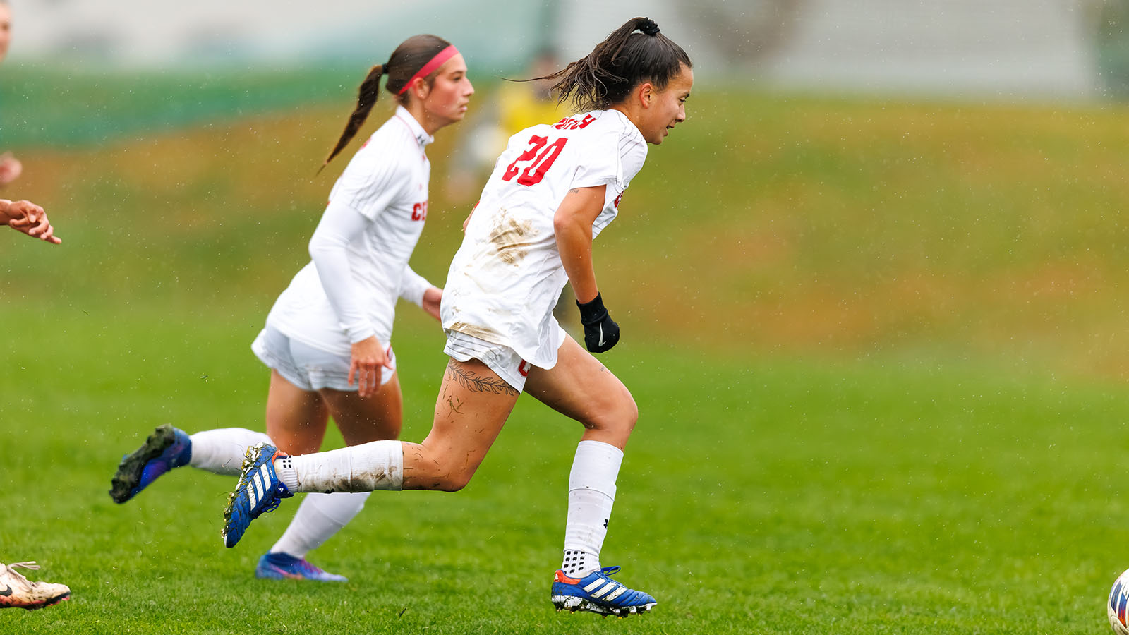 MiMi Pavelka dribbles up the field