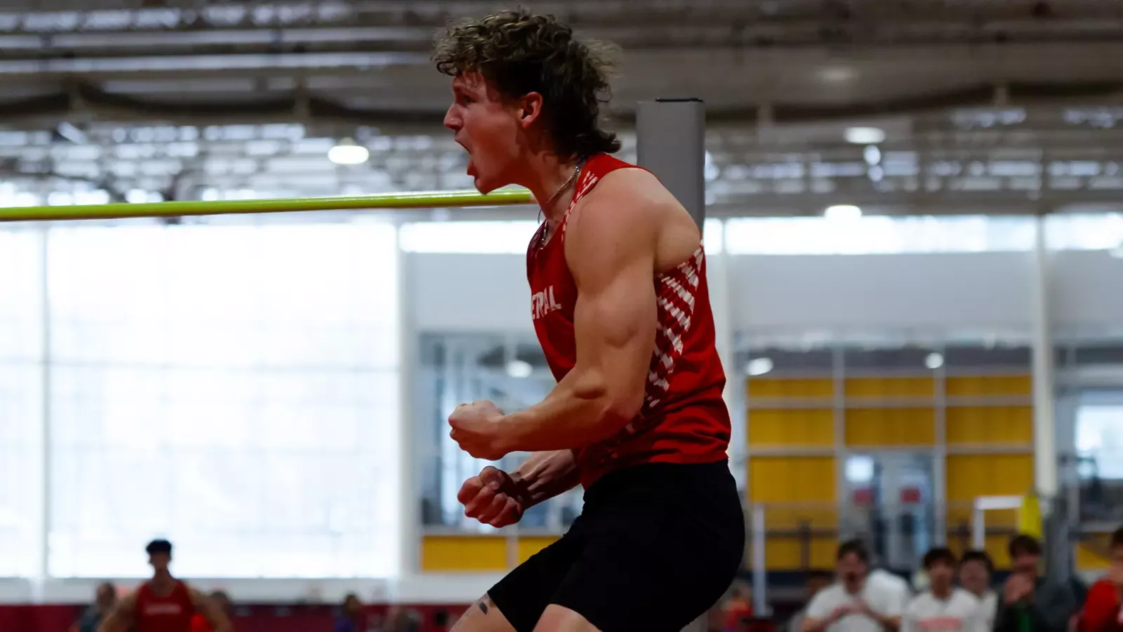 Lance Bunde celebrating after this high jump