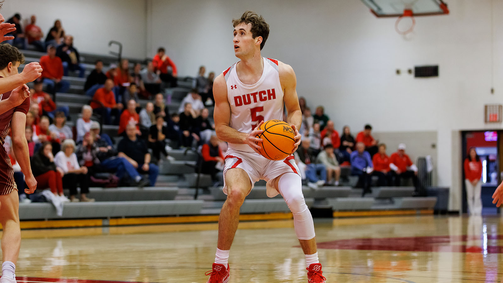 Kaleb Brand looking to pass inside