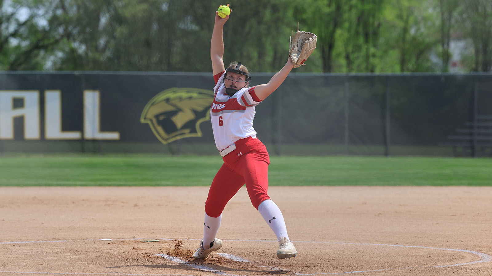 Jadyn Huisman full extension while throwing a pitch