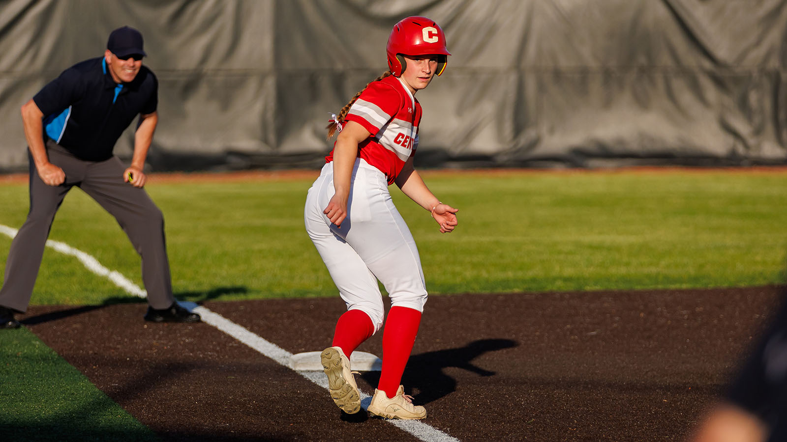 Anya Kistenmacher scampers back to third base