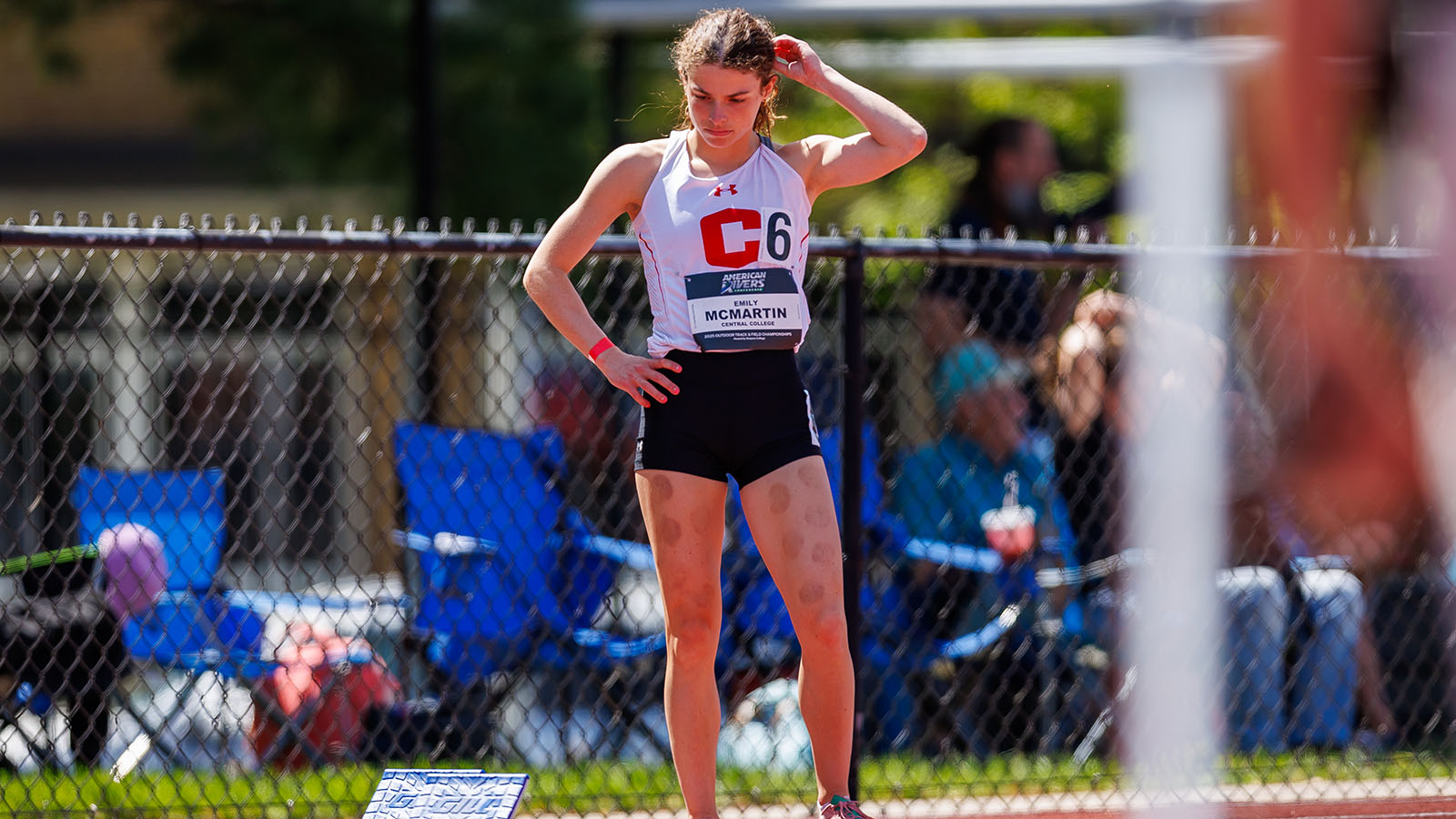Emily McMartin adjusts hair before sprint race