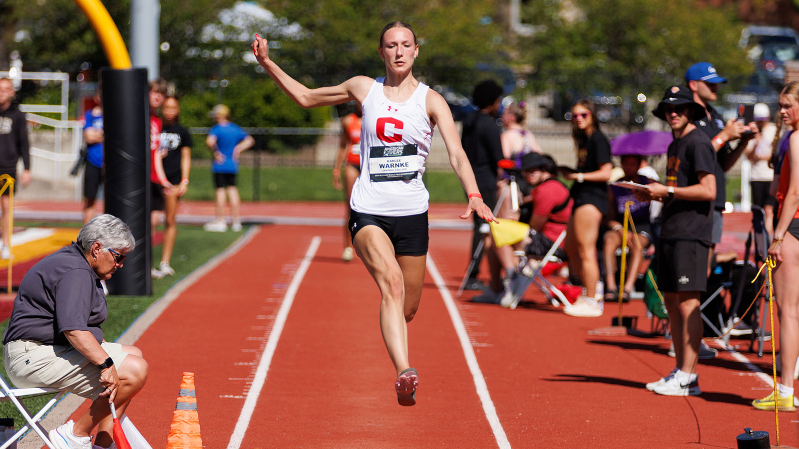 Karlee Warnke running down long jump runway