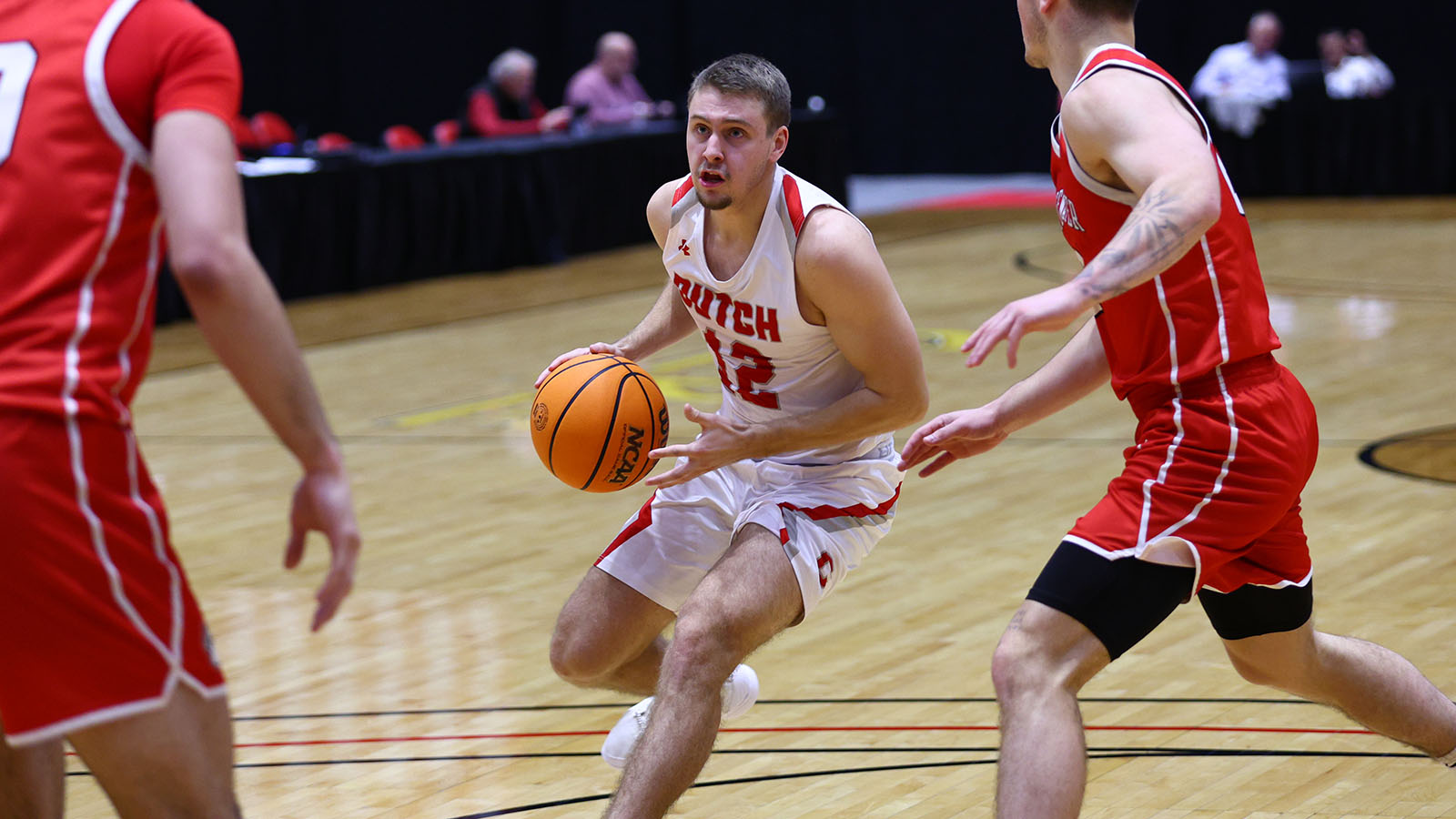Kyle Cason driving through the lane