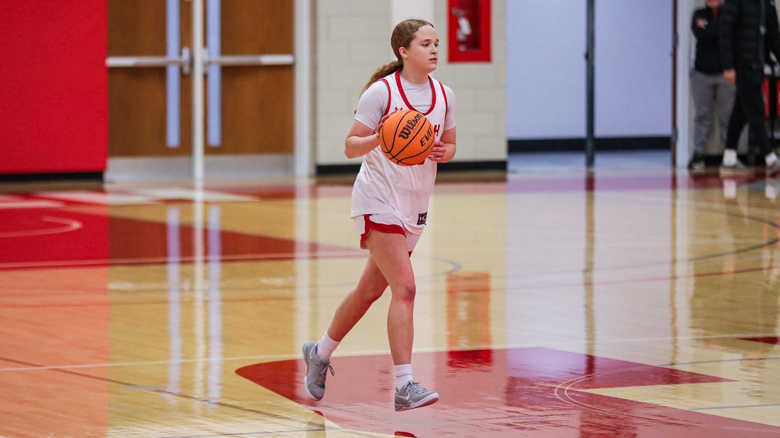 Aubrie Haynes bring the ball up the court