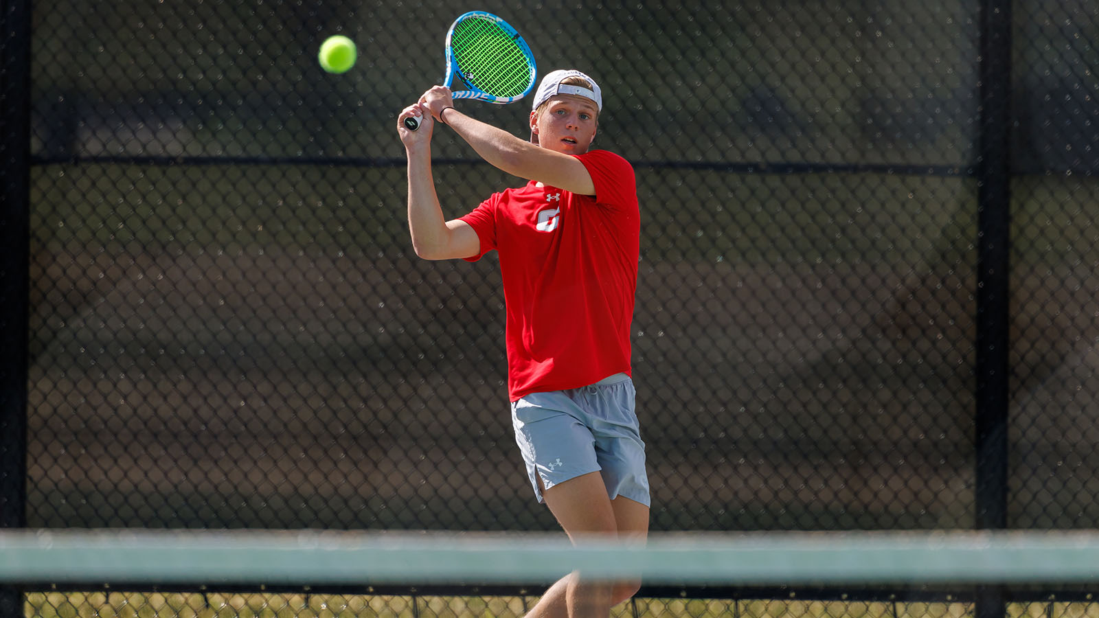 Bodi Kortz watches his backhand shot