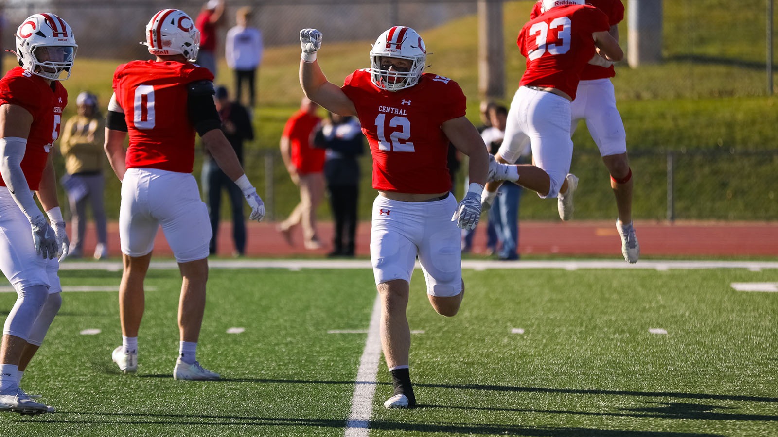 Logan Lursen celebrates coming off the field