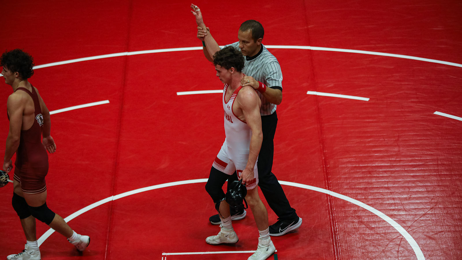 Cade Siebrecht hand raised in victory