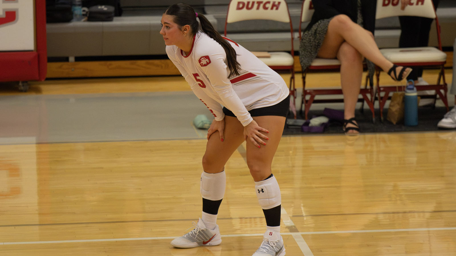 Sophia Folkerts playing volleyball against Monmouth College