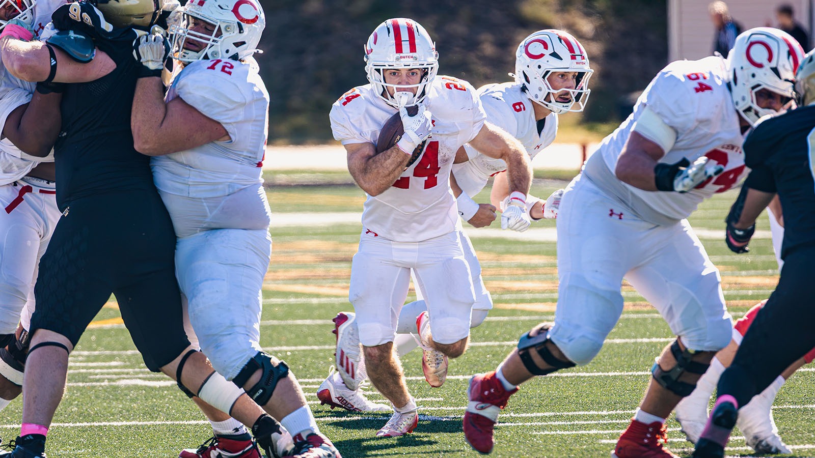 Cody Klein runs through the hole against NWU