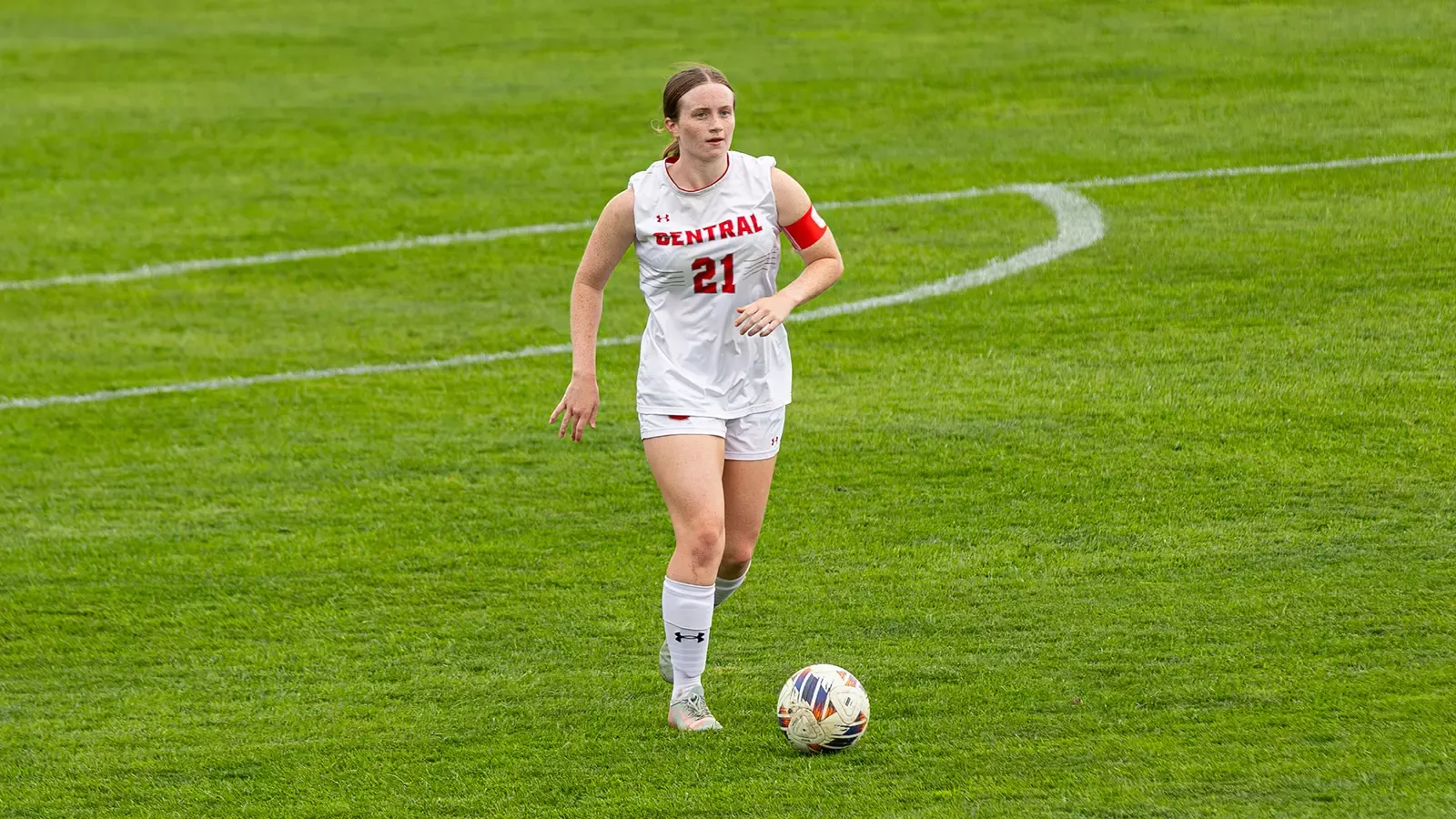 Addison Brown dribbling the ball upfield 