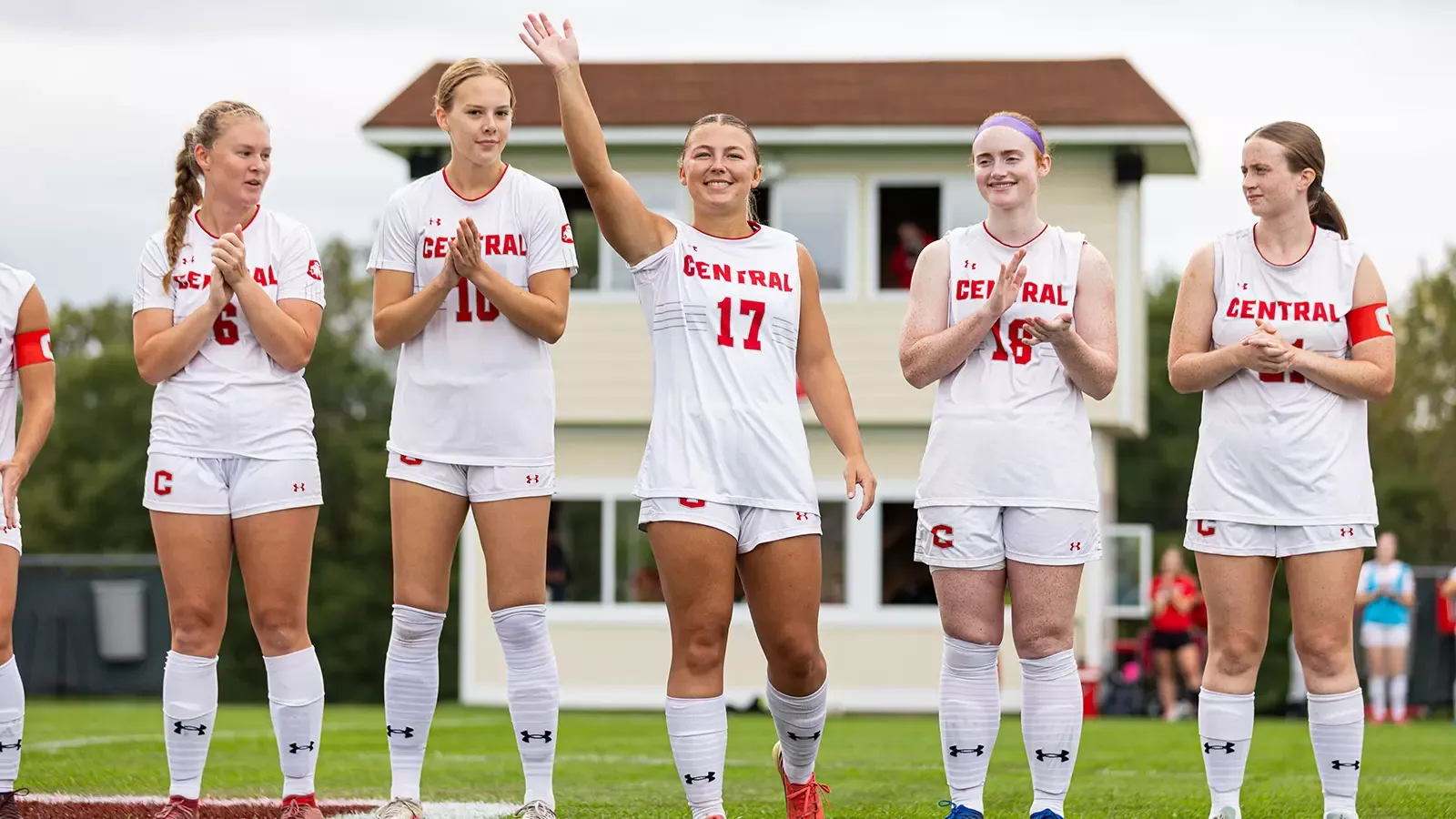 Olivia DeVos waving to the crowd