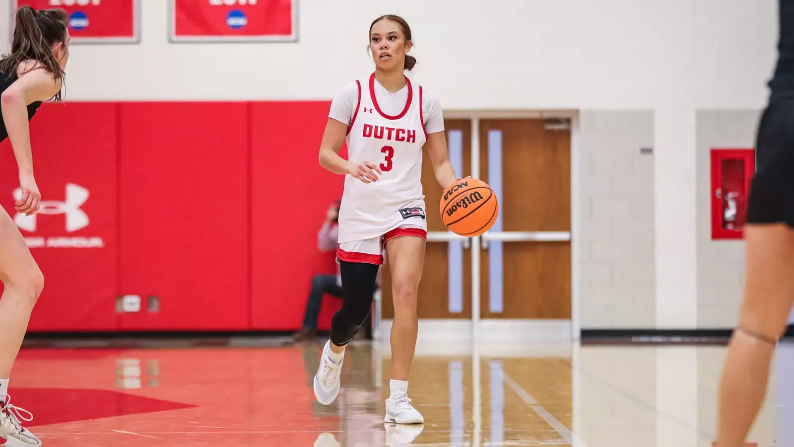 Jasmyn Williams brings the ball up the court against Simpson on February 11, 2026