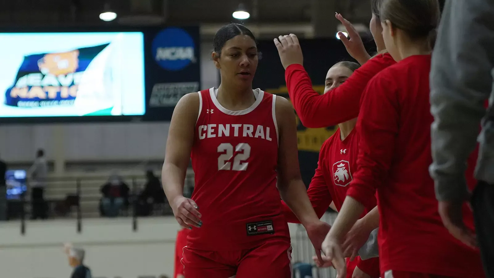 CeCe Moore subbing out and high-fiving teammates 