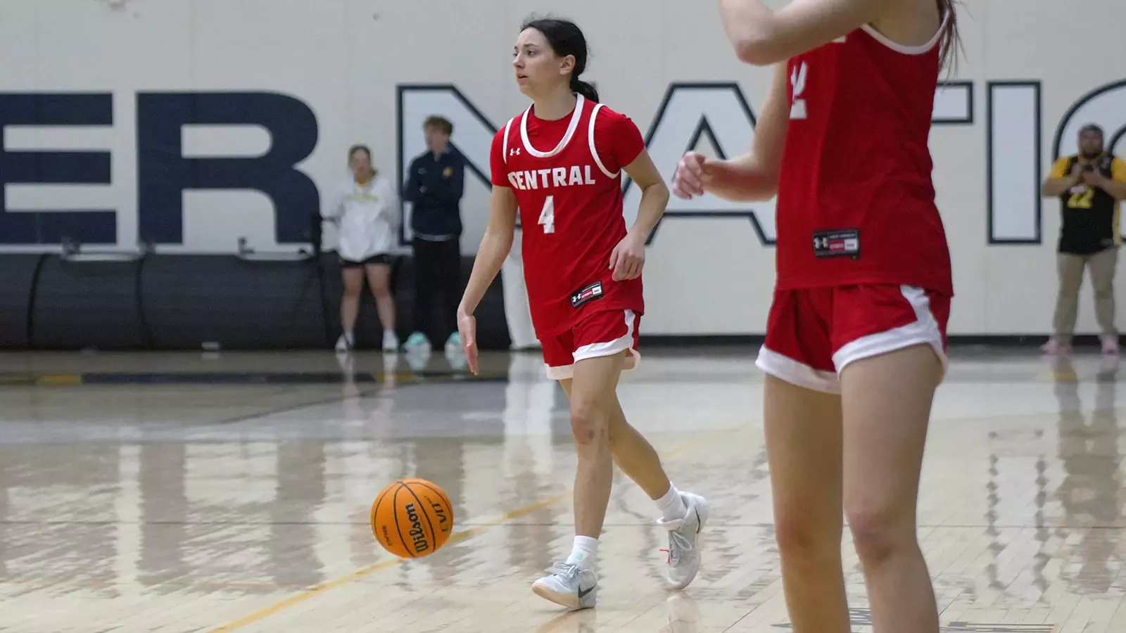 Emily Naughton dribbling the ball against Buena Vista