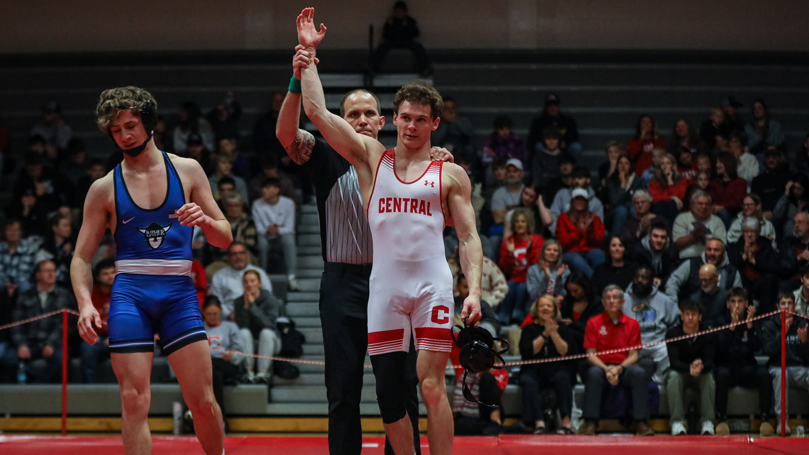 Cade Siebrecht hand raised in victory