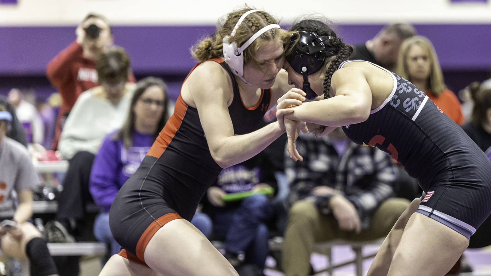 Esther Belzer charges at her opponent