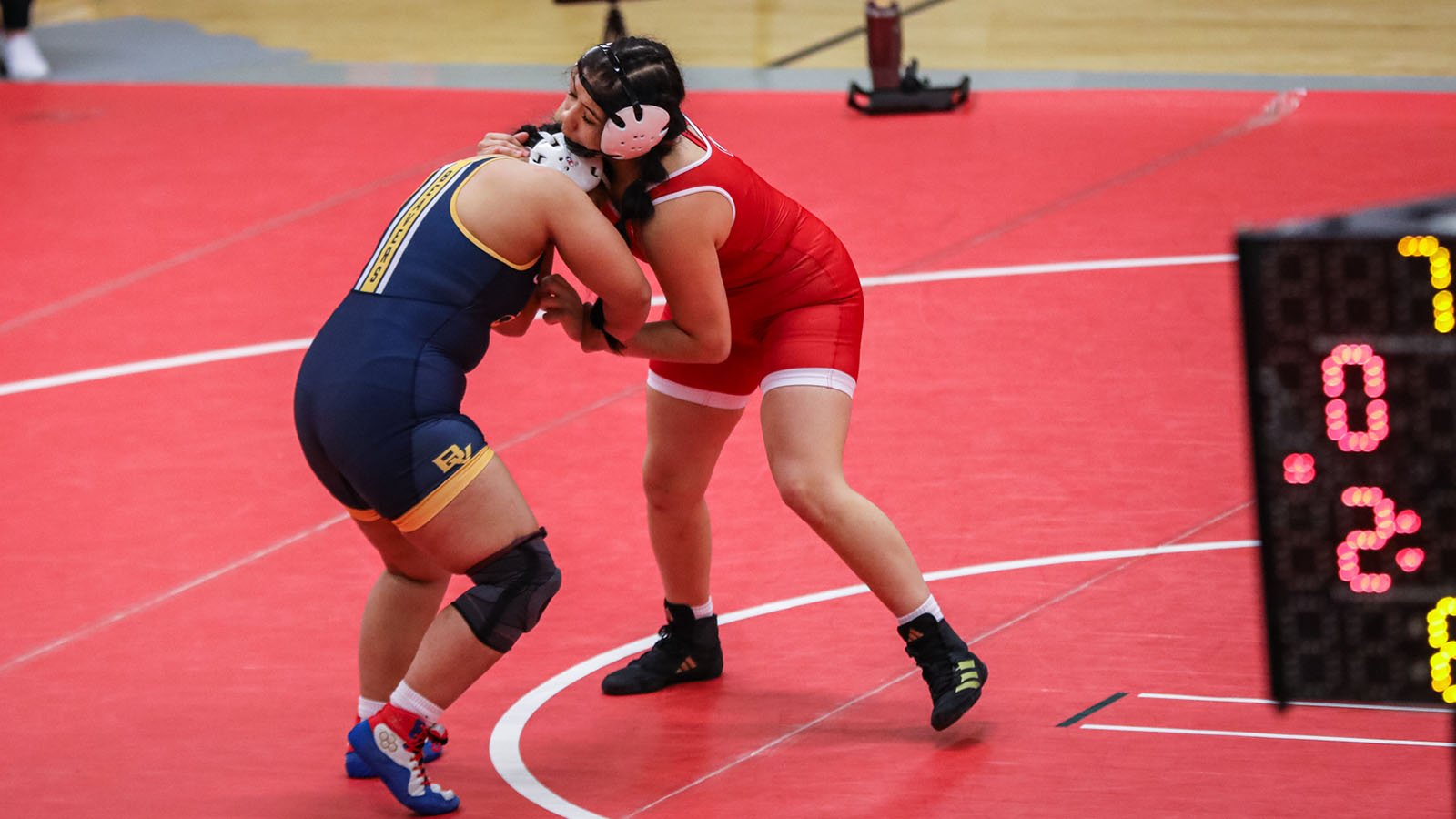 Alondra Alvarez Chavez grappling at conference wrestling tournament