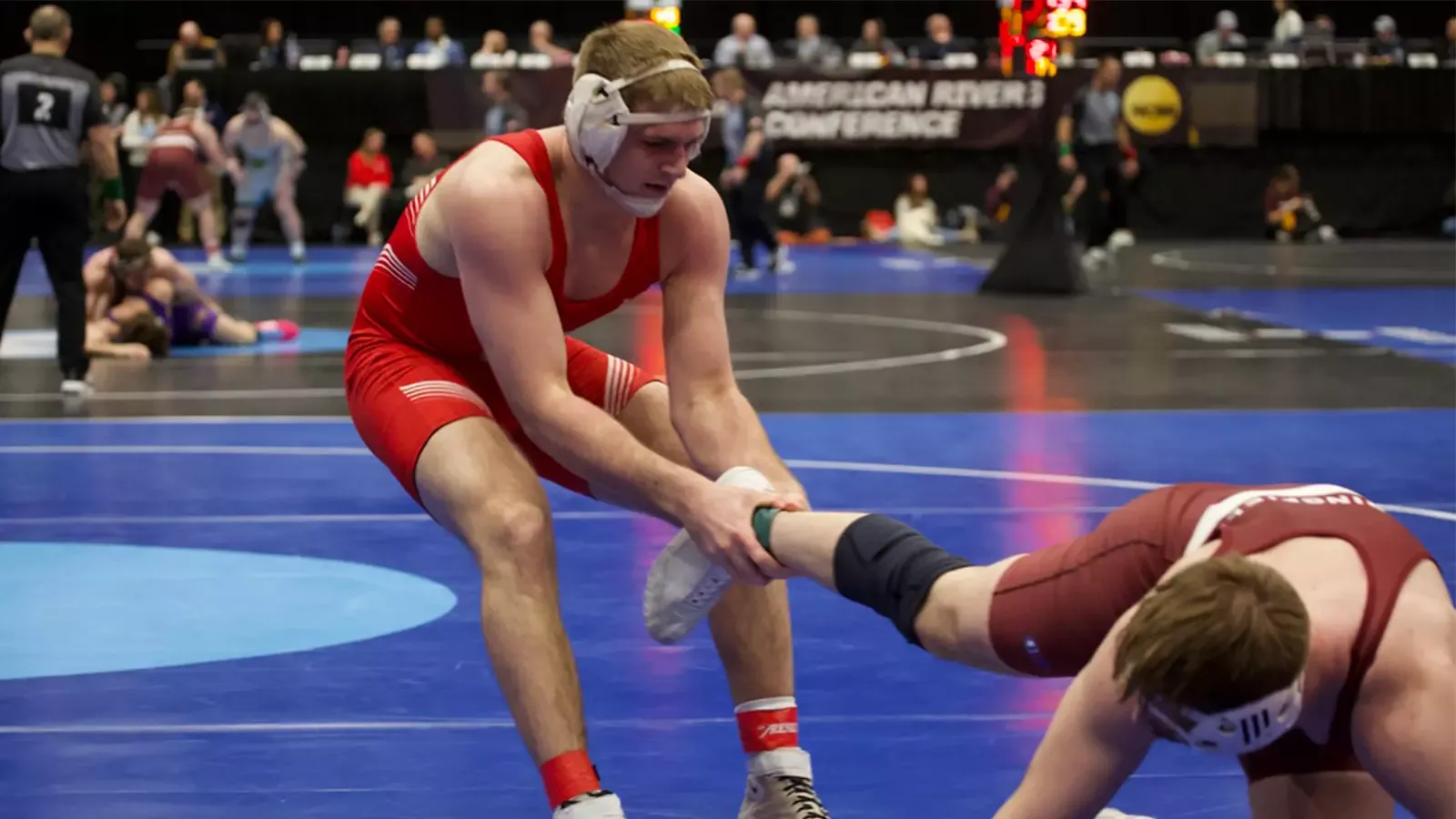 Sam West dragging his opponent by his leg