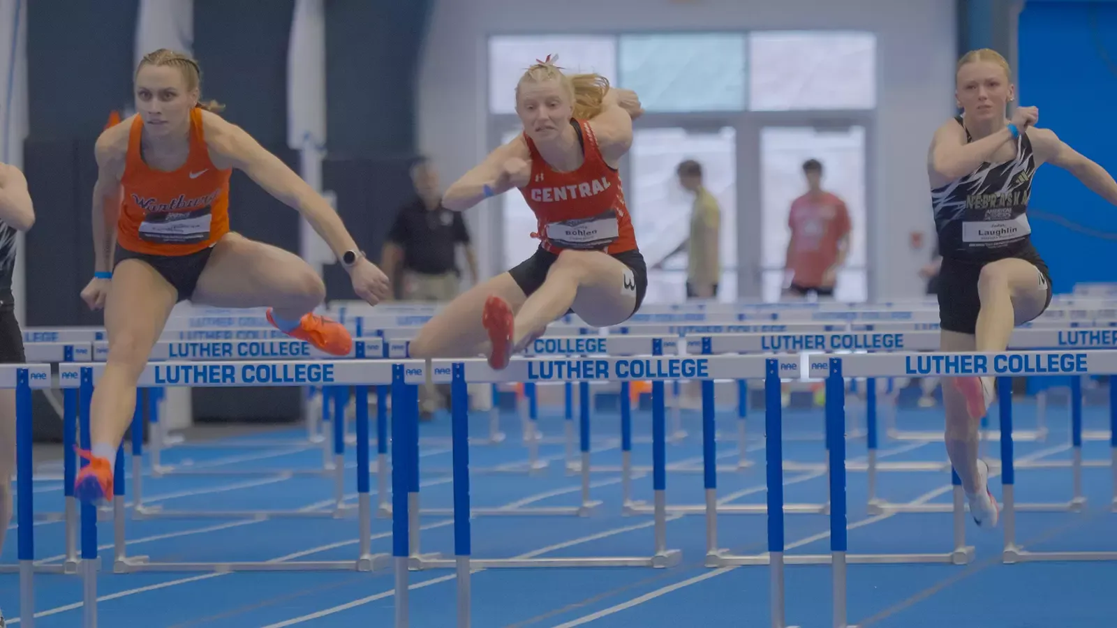 Olivia Bohlen competing in hurdles