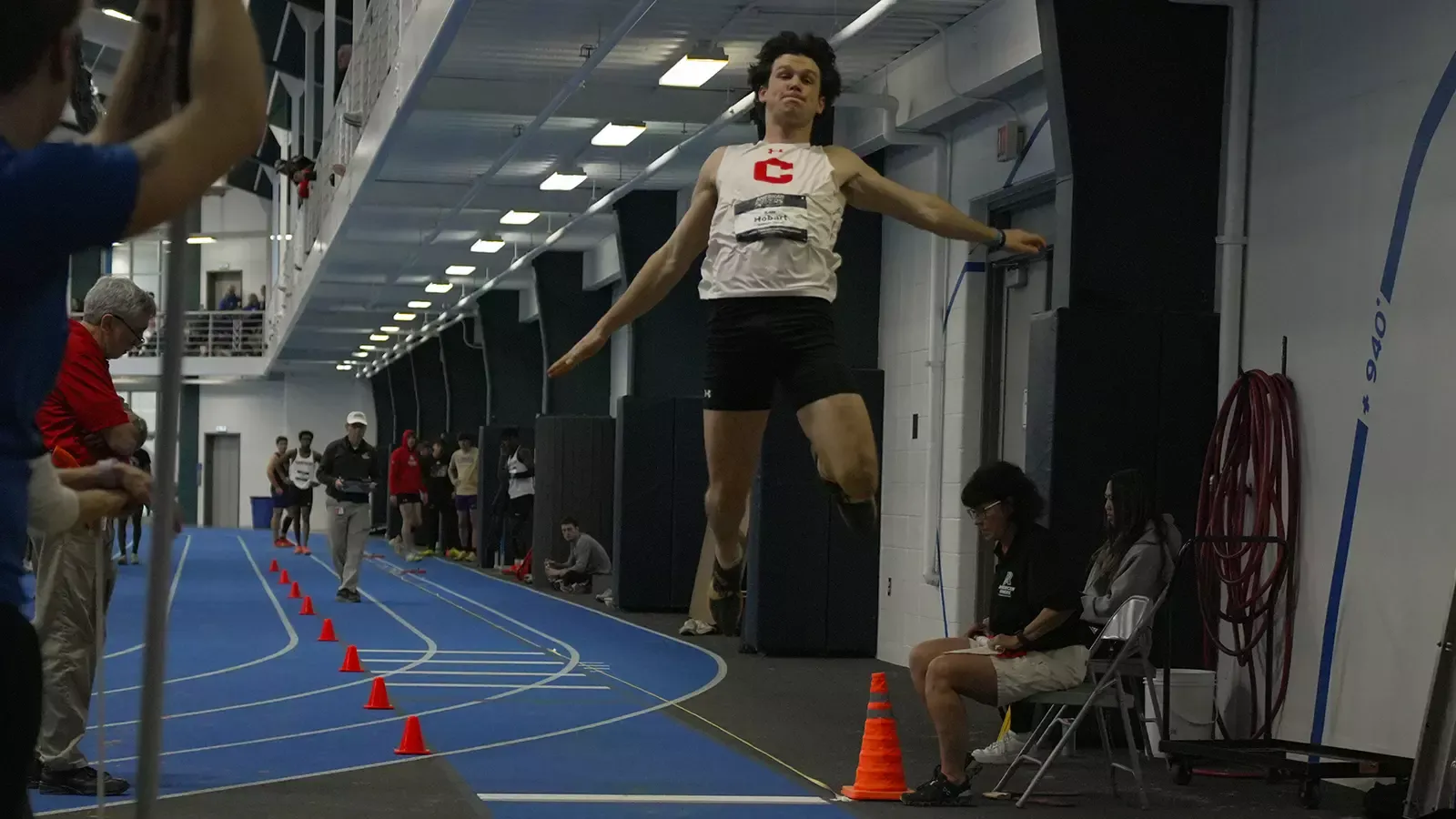 Kale Hobart jumping into sand pit