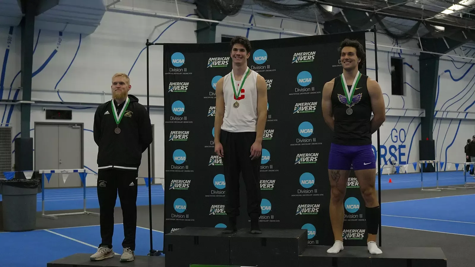 Kyle Rogers in first place spot on podium 