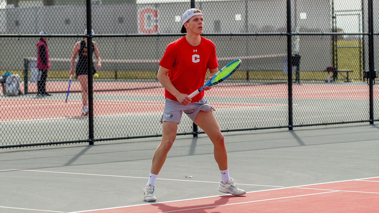 Bodi Kortz waits on the baseline against Willamette