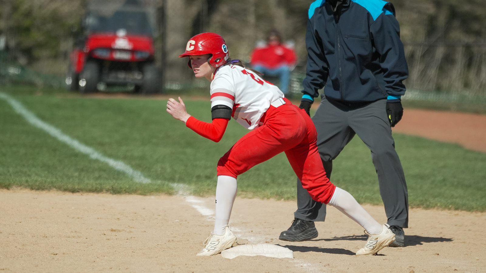 Rylee Dunkin on first base getting ready to run