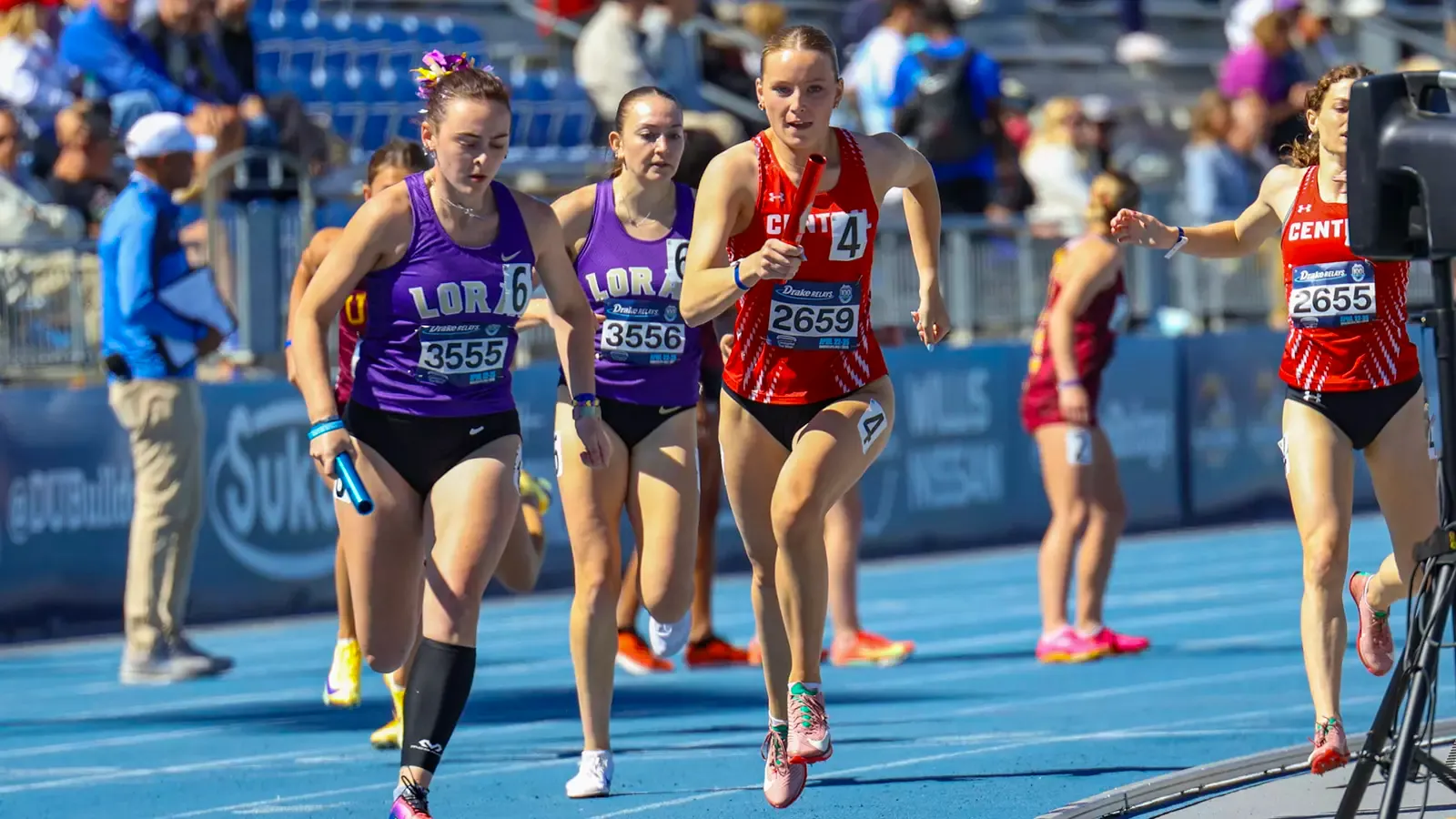Kennedy Petersen getting the handoff during the 4x400 relay 