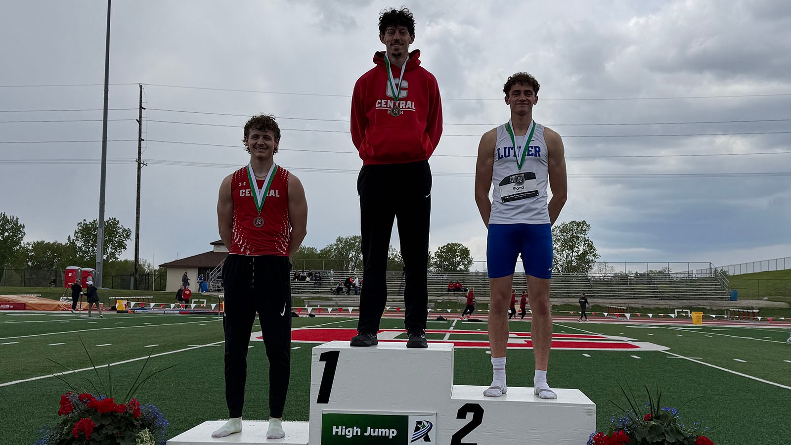 Gunner Meyer on conference high jump podium