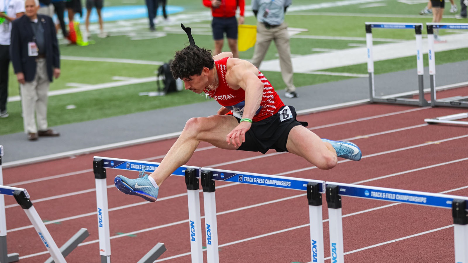 Gunner Meyer hurdling in 110 NCAA Finals