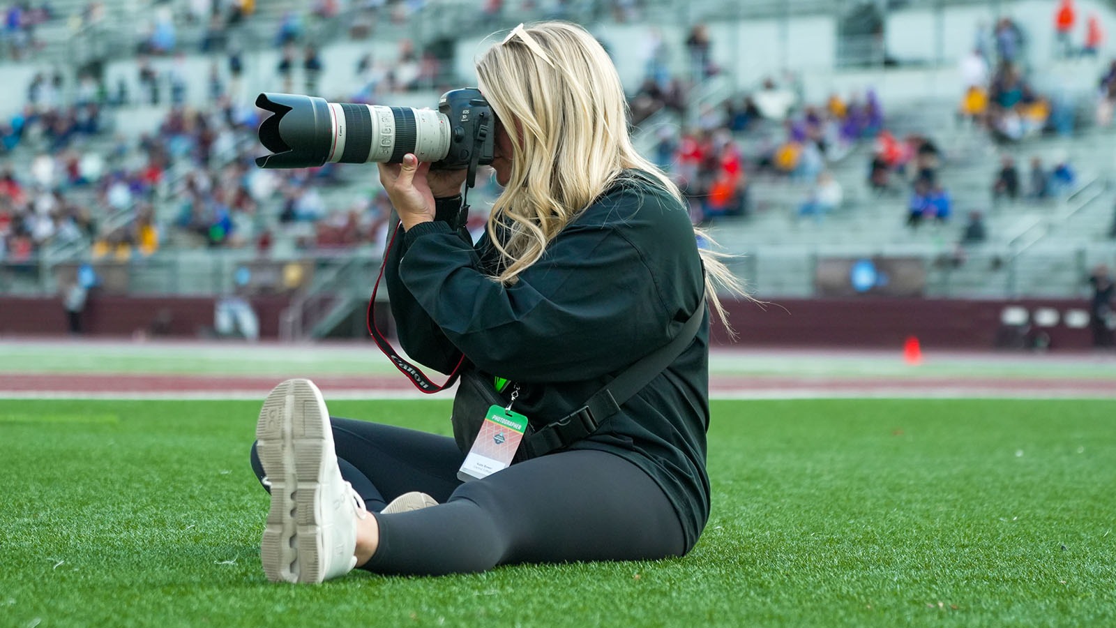 Katie Bower taking pictures at 2026 NCAA Outdoor Track and Field Championships