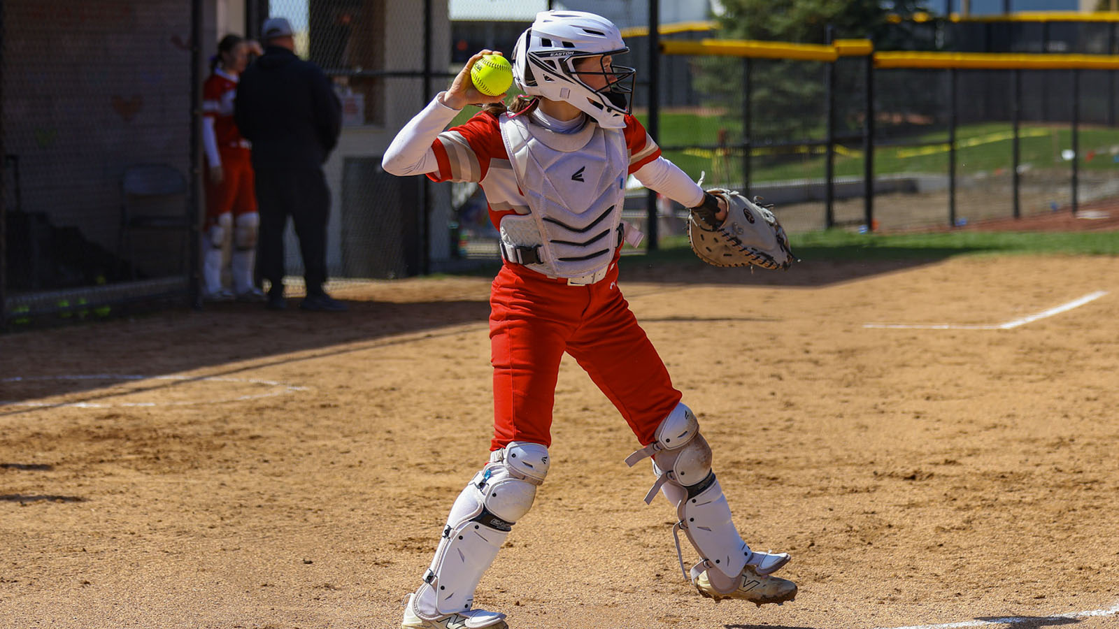 Rylee Dunkin throws the ball back to the catcher