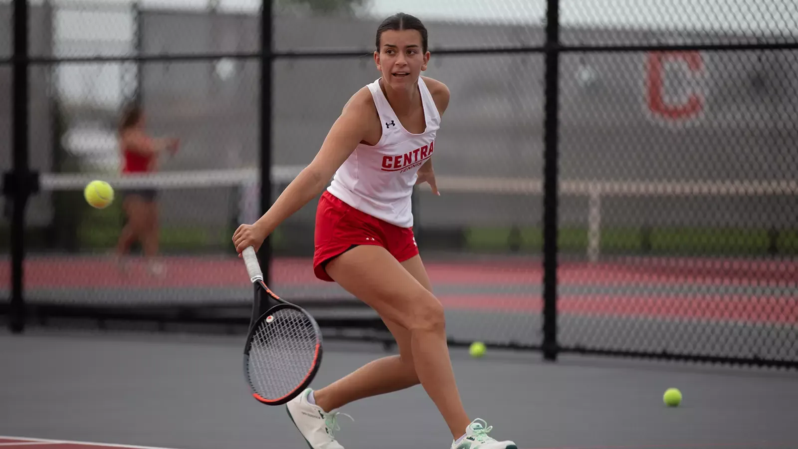 Emma Murphy returning the ball via a backhand shot