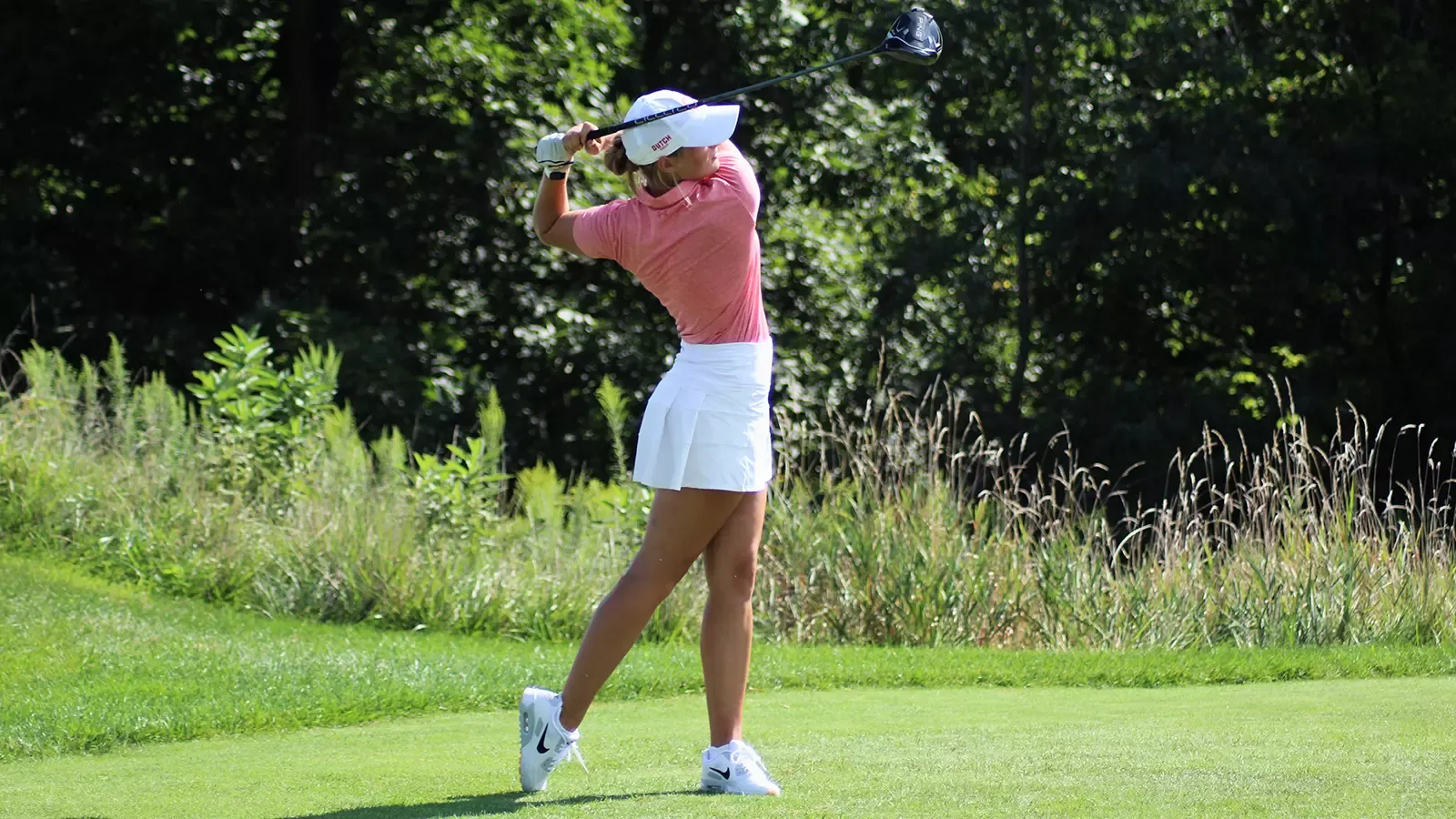 Allie Pfantz in her follow through after hitting driver