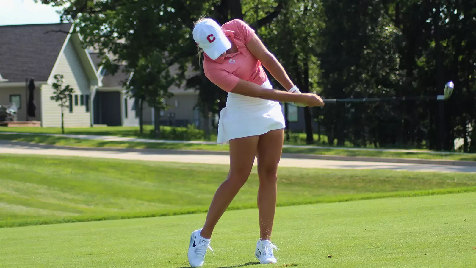 Allie Pfantz hitting an iron shot 