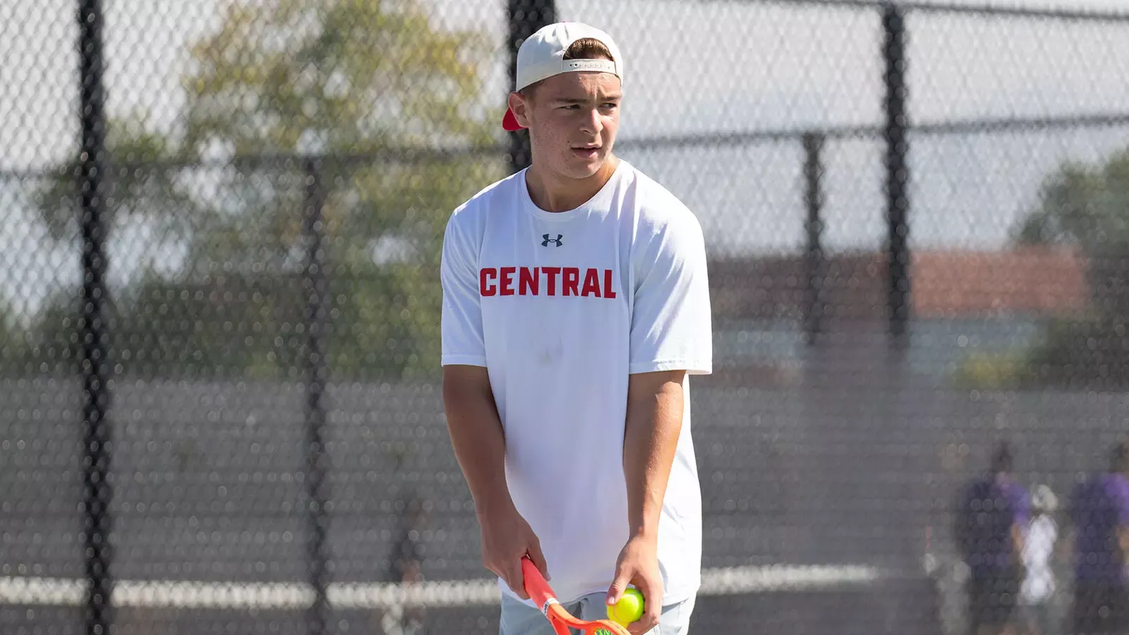 Joseph Wright preparing to serve at  Central Invitational