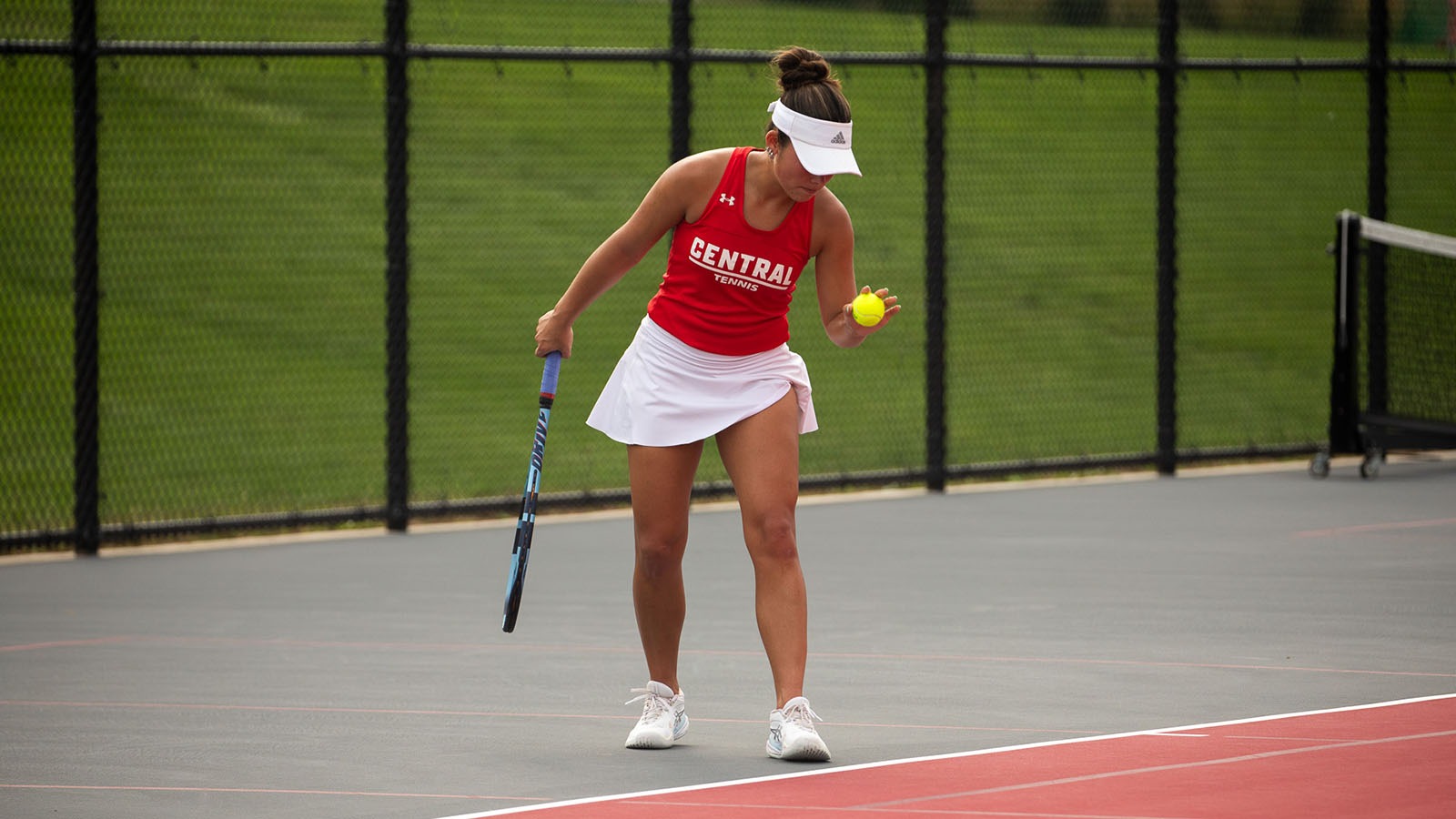 Claire Smock serving against Wartburg
