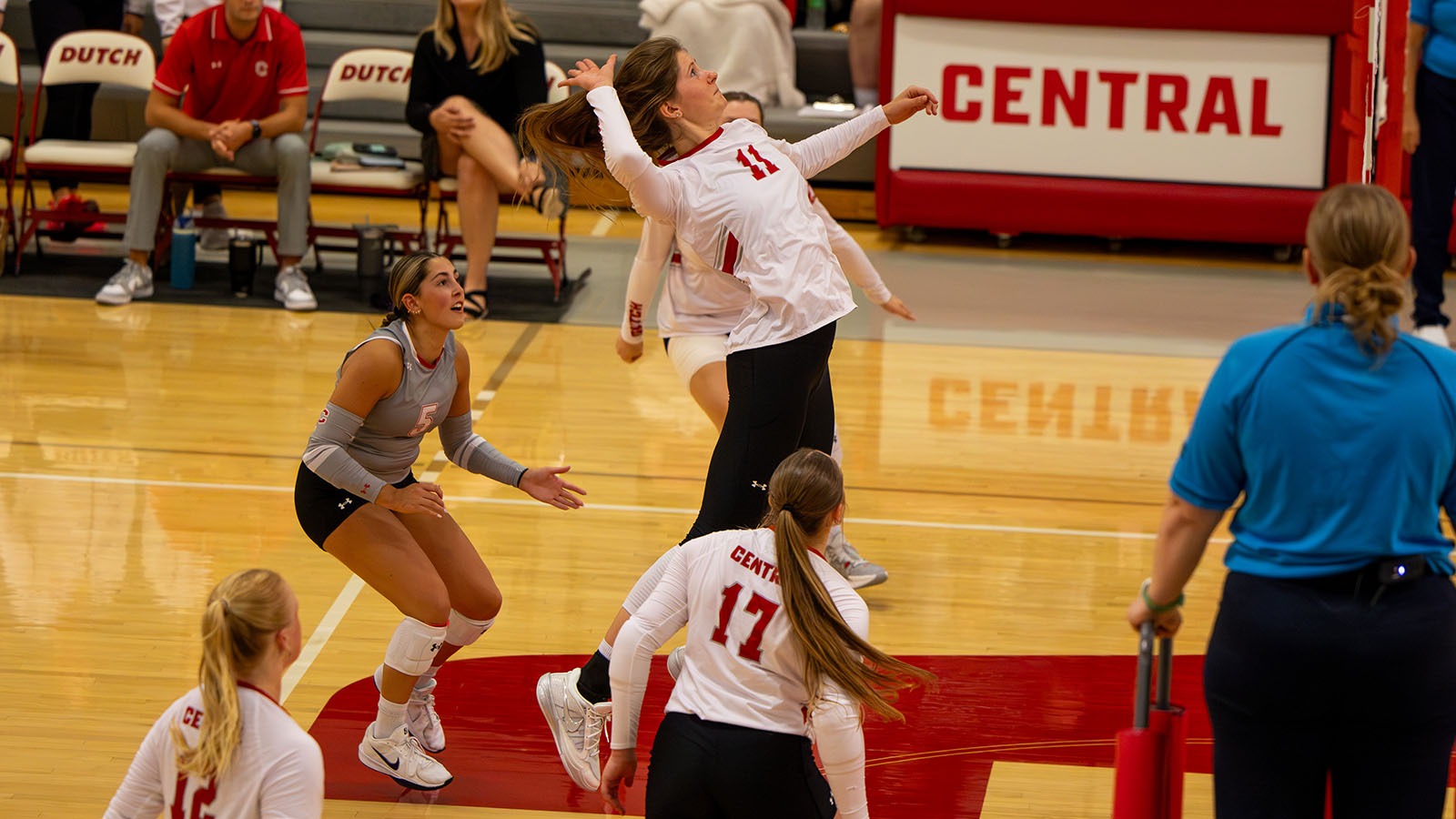 Kaitlyn Mumm jumps at the net against Monmouth