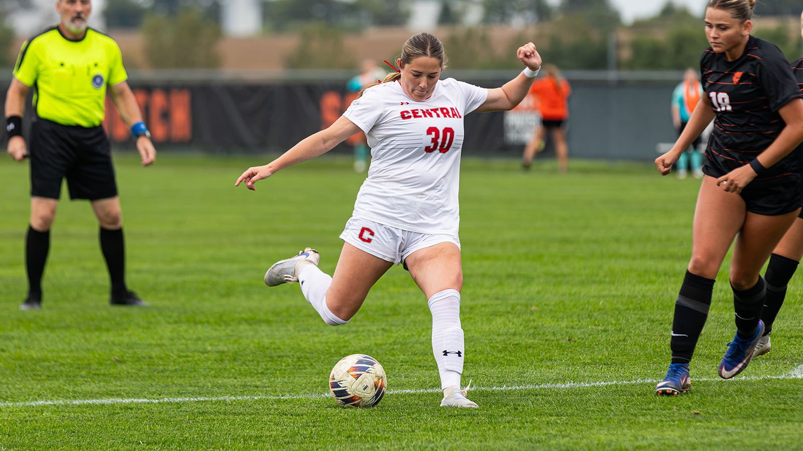 Rylee Rustad kicking at the goal against Greenville