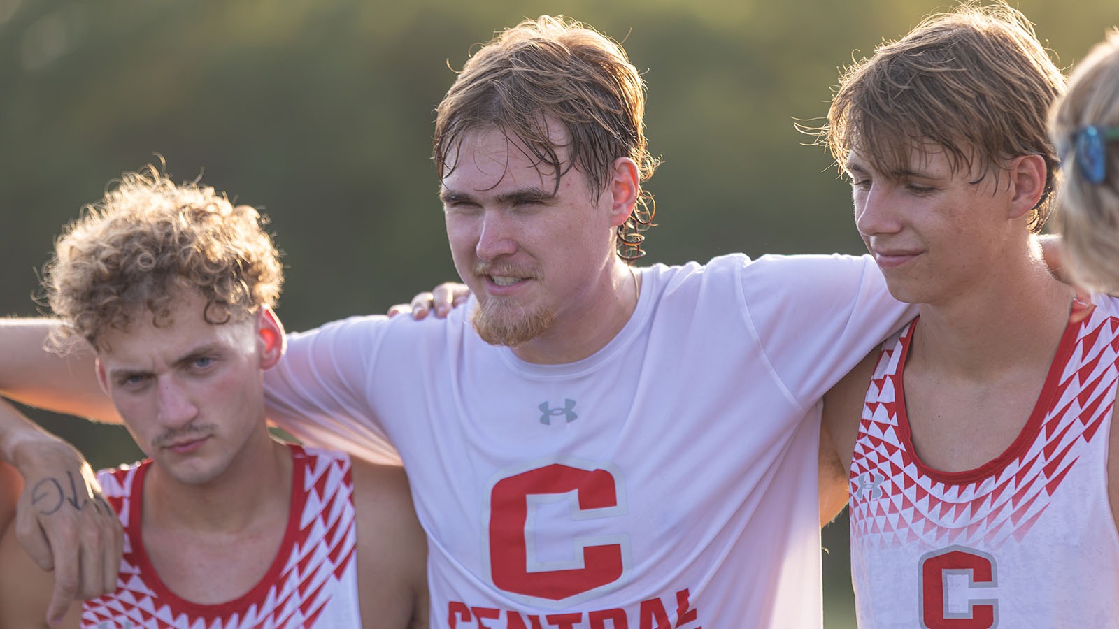 William Wadsley talks to Dutch men's cross country team before Dutch Invitational