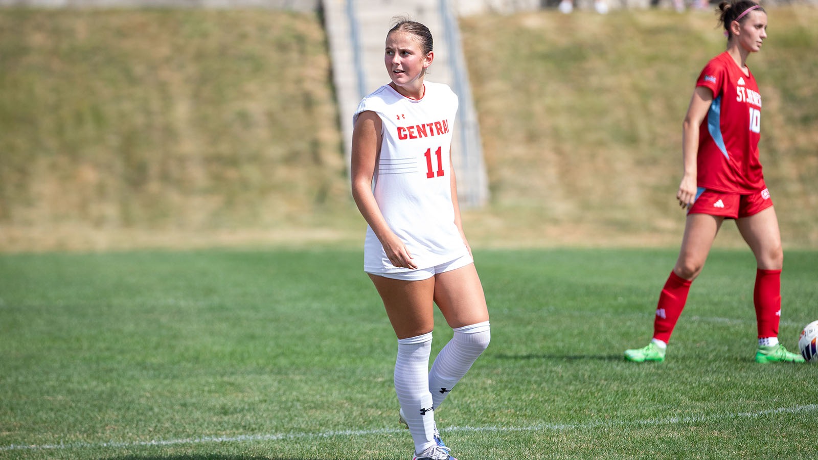 Finley Baker walking on the pitch against St. Benedict