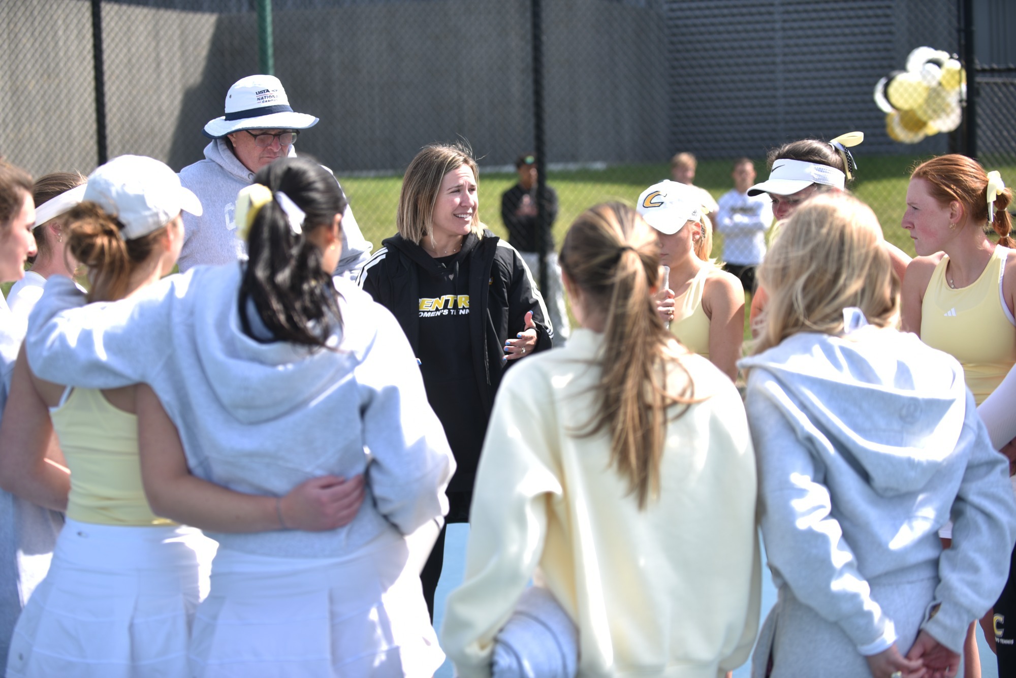 Women's Tennis team huddle
