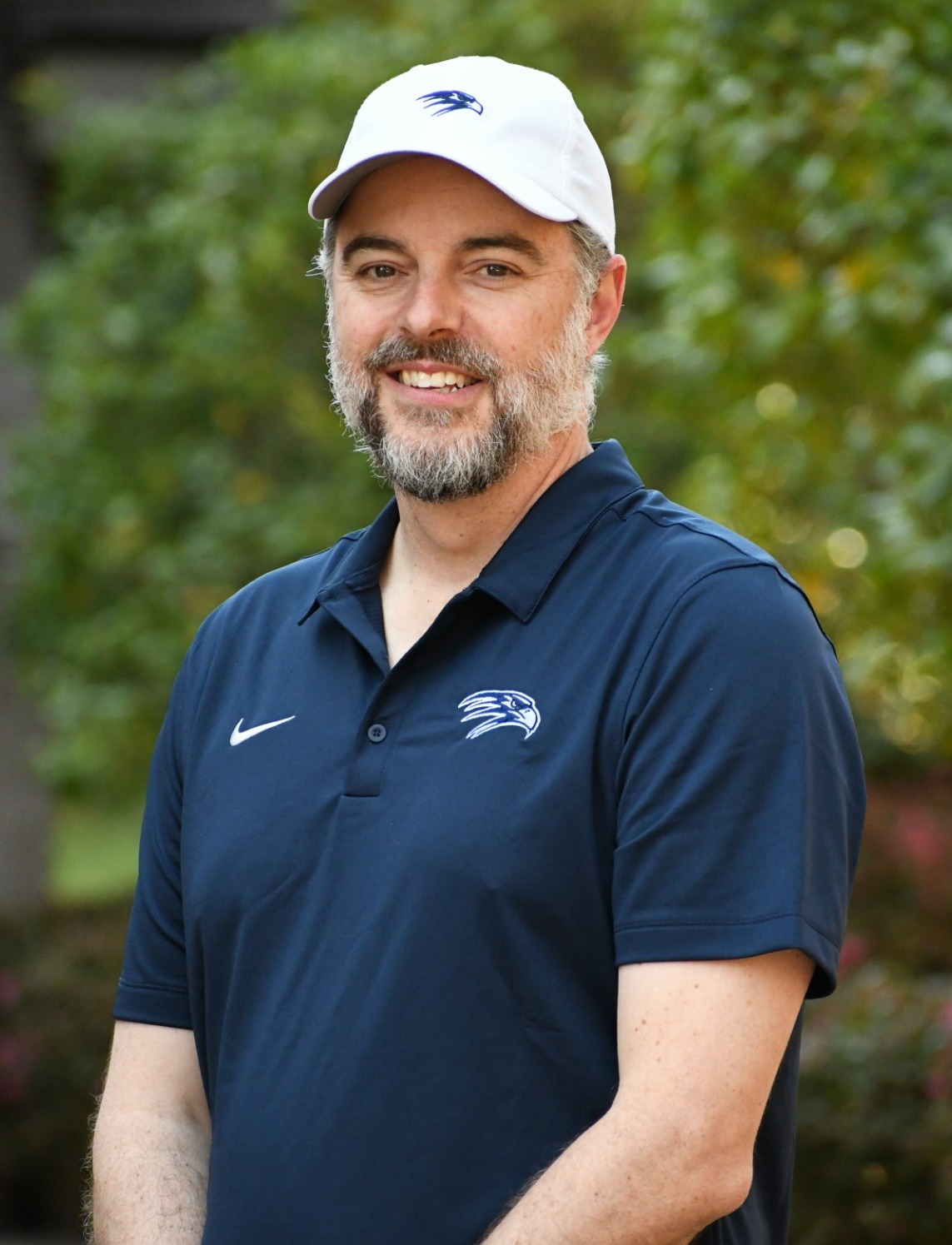 Chuck Edwards, the head coach of the Middle School boys' golf team