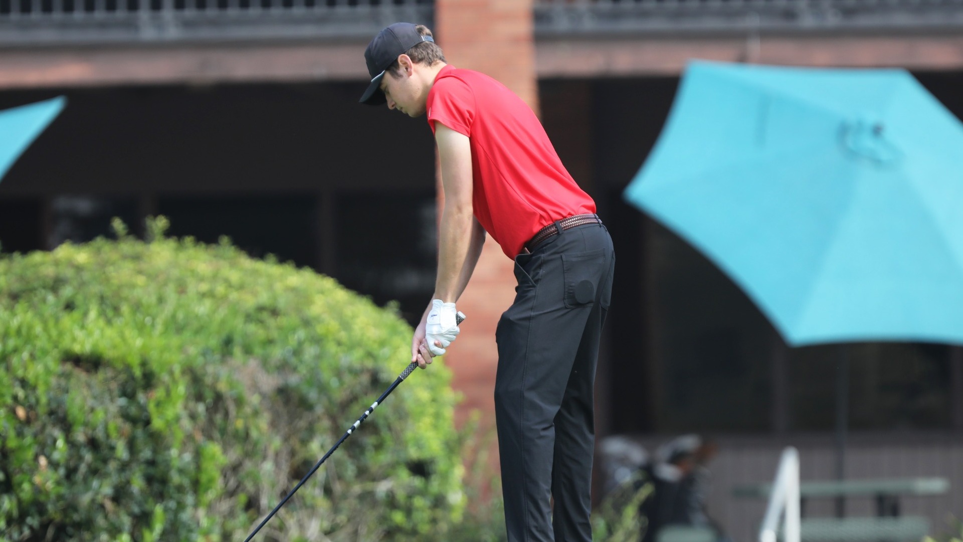 Ben Soicher lines up a tee shot. 