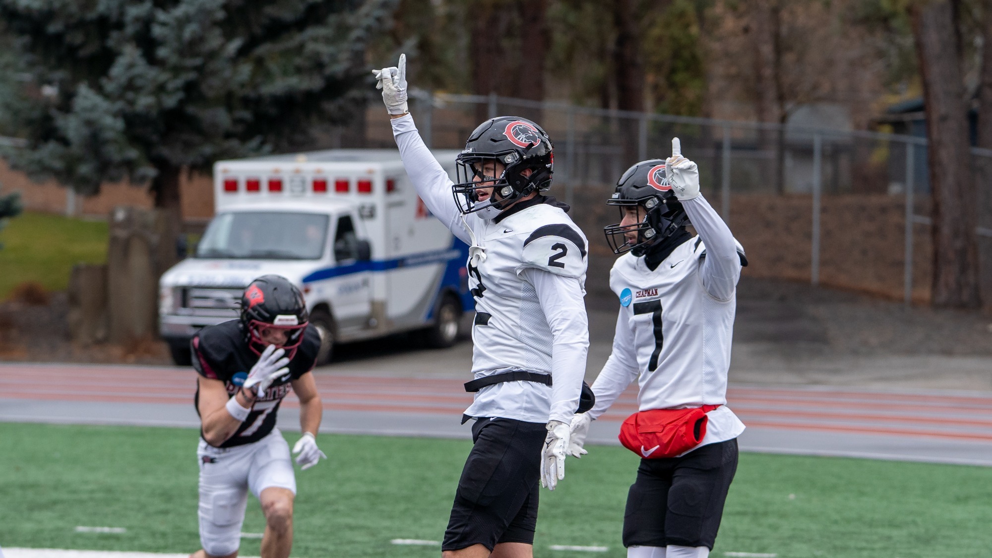 Miles Grossman and Sawyer Hughes celebrate breaking up a pass.