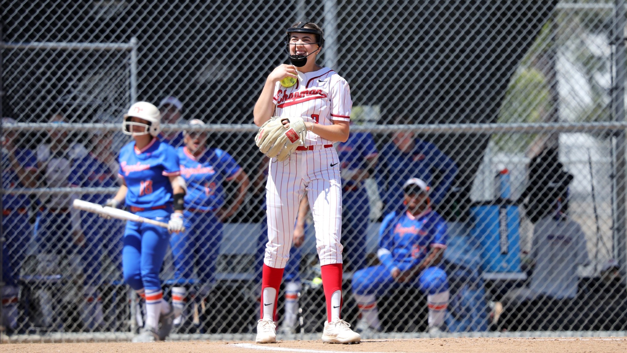 Rose Malen smiles on the softball field.