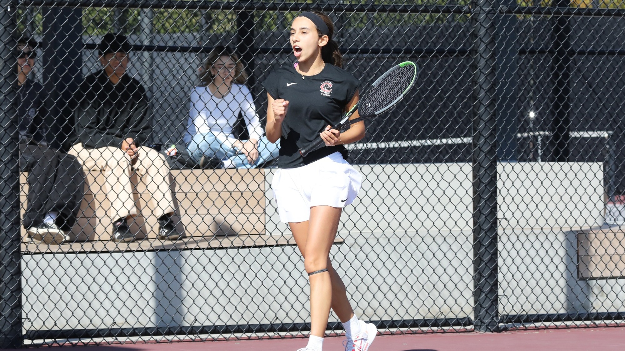 Alexis Golin celebrates winning a point.