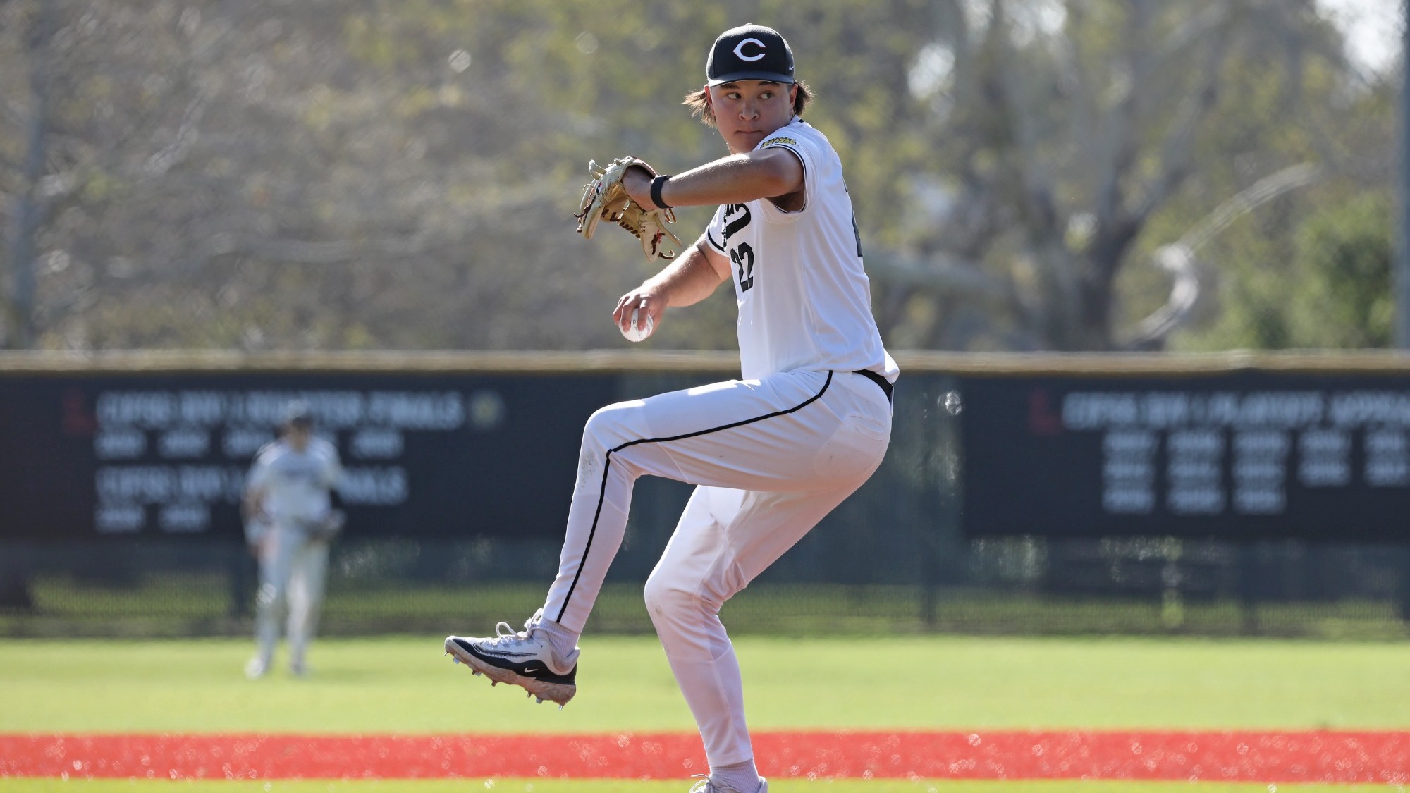 Max Banks pitching in a baseball game.